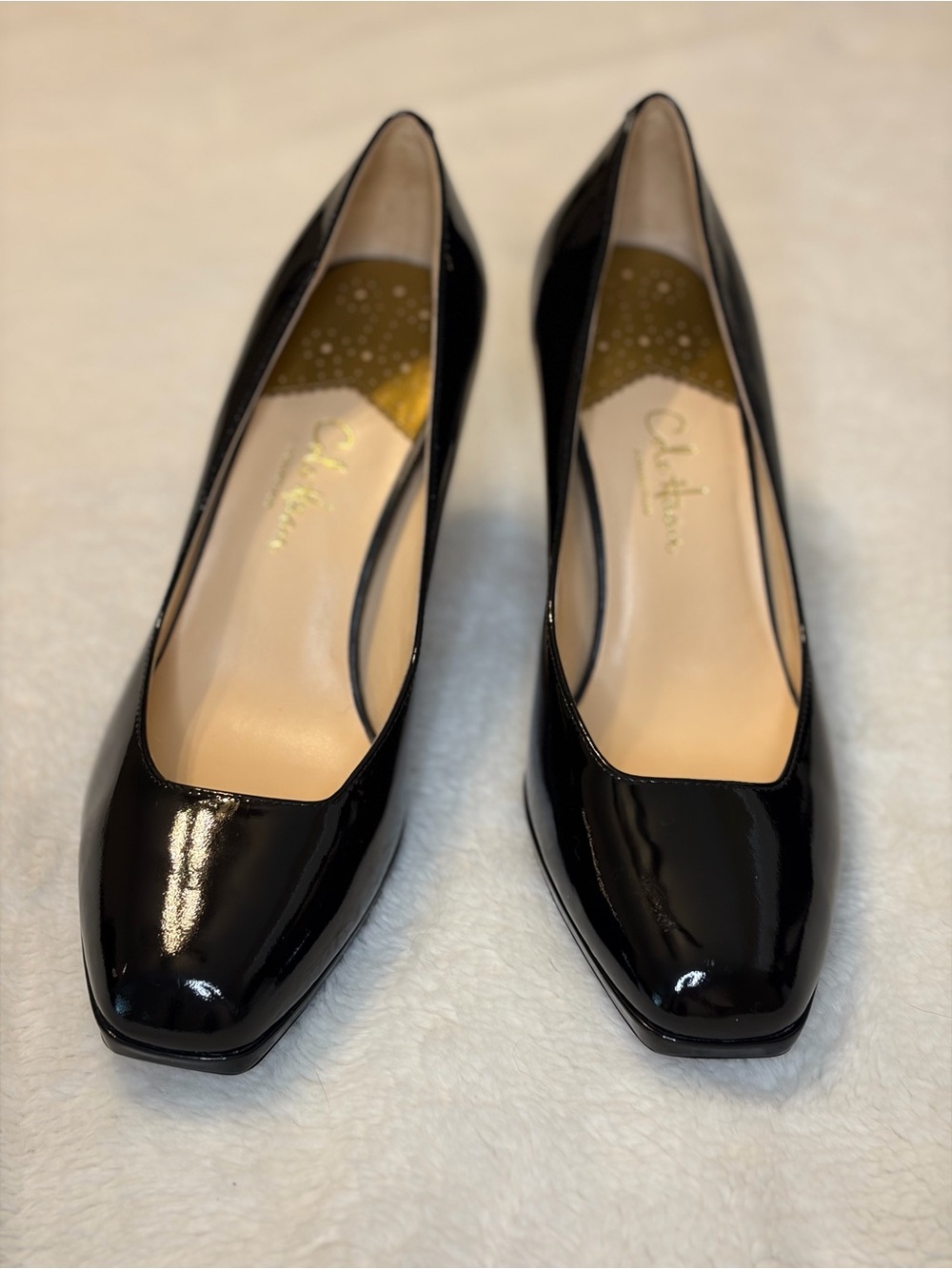 Cole Haan Carma Air Pumps in black patent leather
